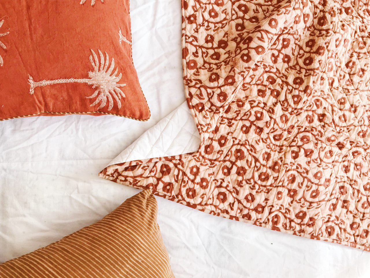 Terracotta Gumnuts Organic Baby Quilt